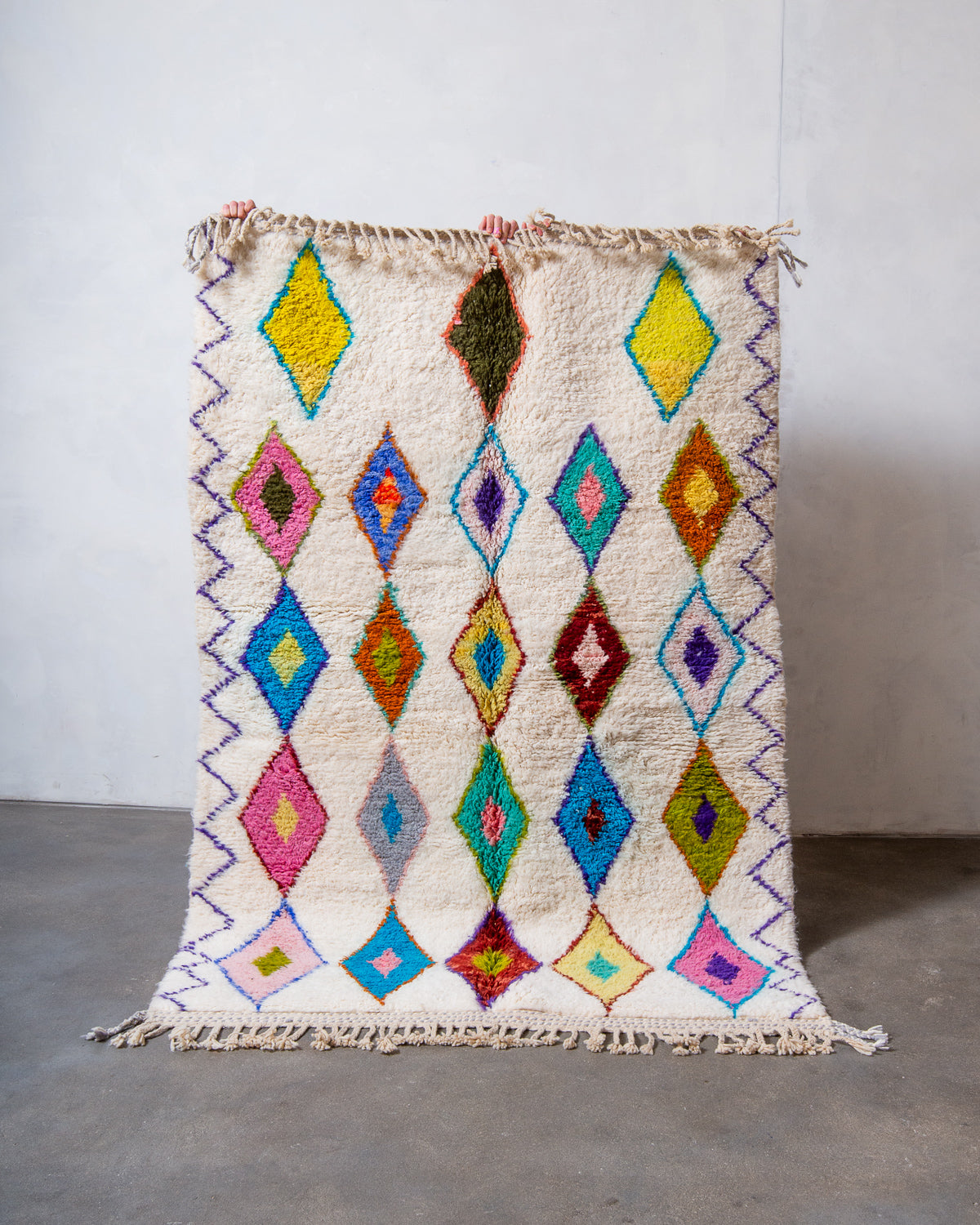 Modern, designer, handcrafted Berber rug from Morocco. Beniourain carpet with beautiful colours and patterns and fluffy wool texture.
